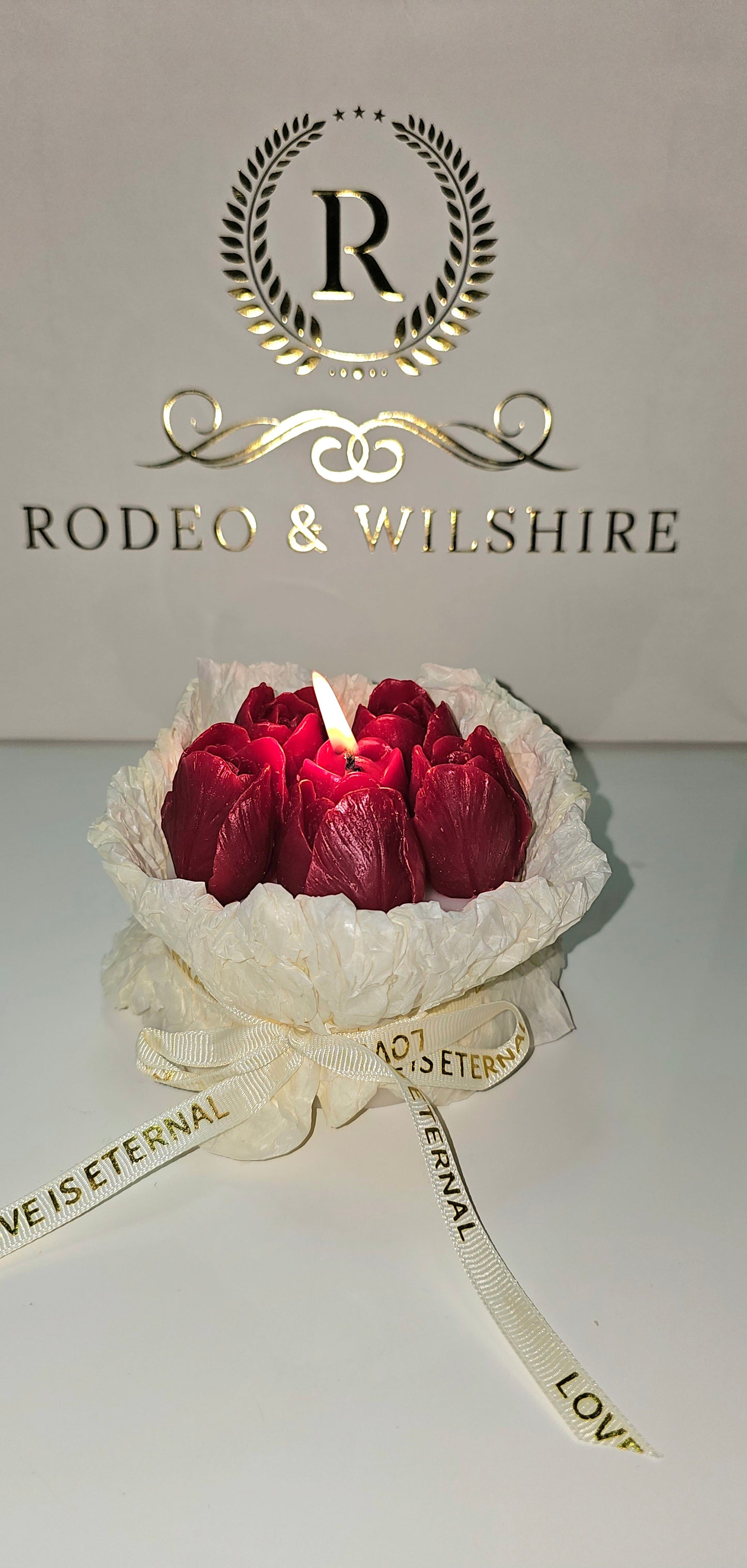 Roses Bouquet Candle styled on coffee table – dopamine decor floral accent