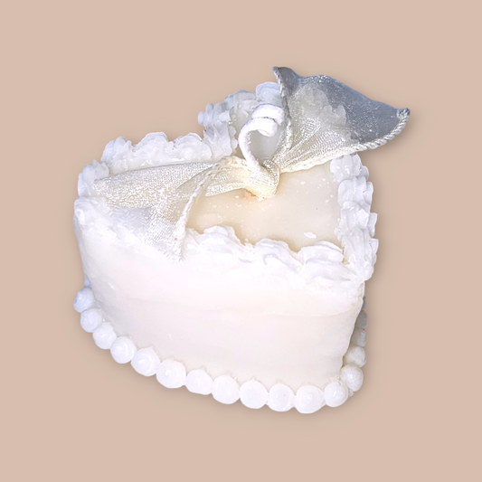 Buttercream Amour Candle front view – vintage heart cake candle in white.