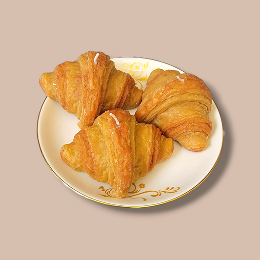 Golden Butter Croissant Candle front view – realistic French bakery candle.