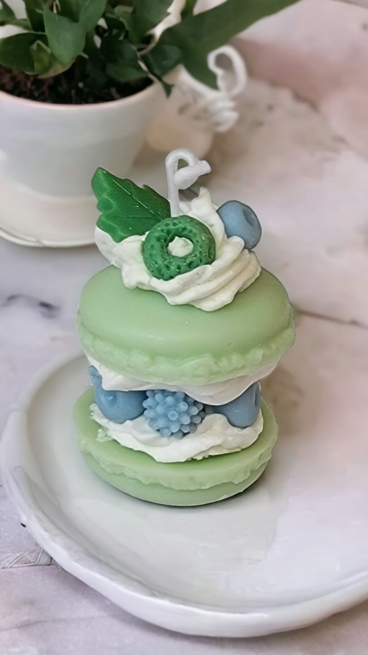 Side view of Macaron Parfait Candle – luxury Parisian patisserie candle decor.