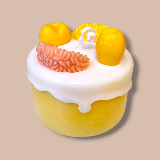 Orange Creamsicle Delight Candle front view – realistic orange cake candle.