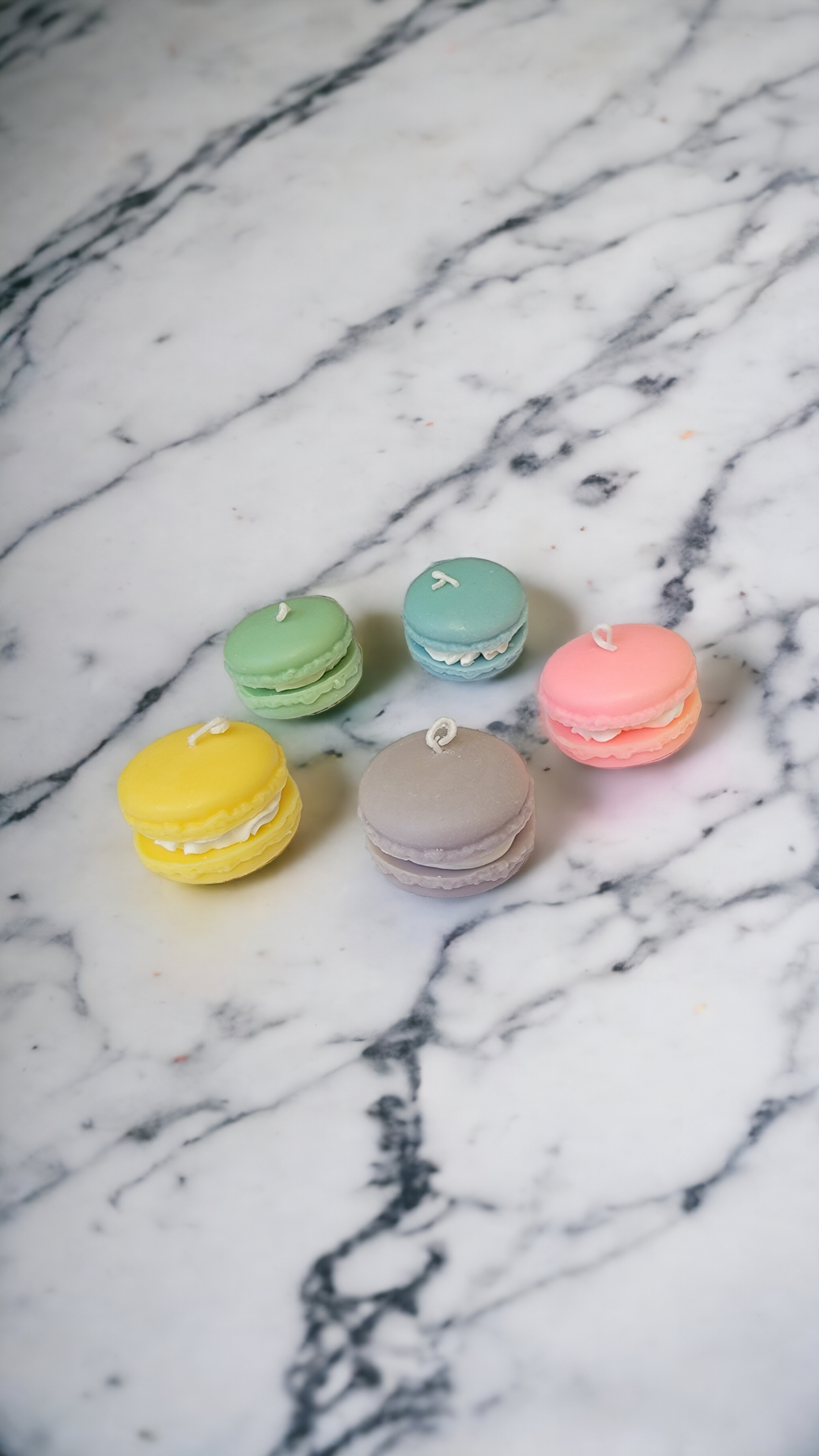 Closeup of Patisserie Macaron Candle – chantilly cream swirl detail.